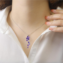 Load image into Gallery viewer, model wearing amethyst pendant, model wearing amethys jewelry, affordable amethyst jewelry, amethyst leaf pendant
