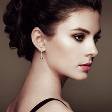 Load image into Gallery viewer, model wearing earrings