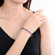 Load image into Gallery viewer, hand showcasing the Sterling Silver Amethyst Bracelet,  $ 200 - 300, Amethyst, Oval, Purple, 925 Sterling Silver, Tennis