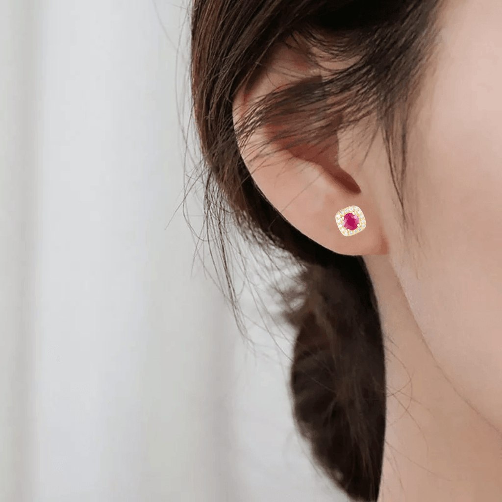 model showcasing Genuine Ruby Halo Earrings with Moissanite Accents Gold Plated Silver Stud Earrings 