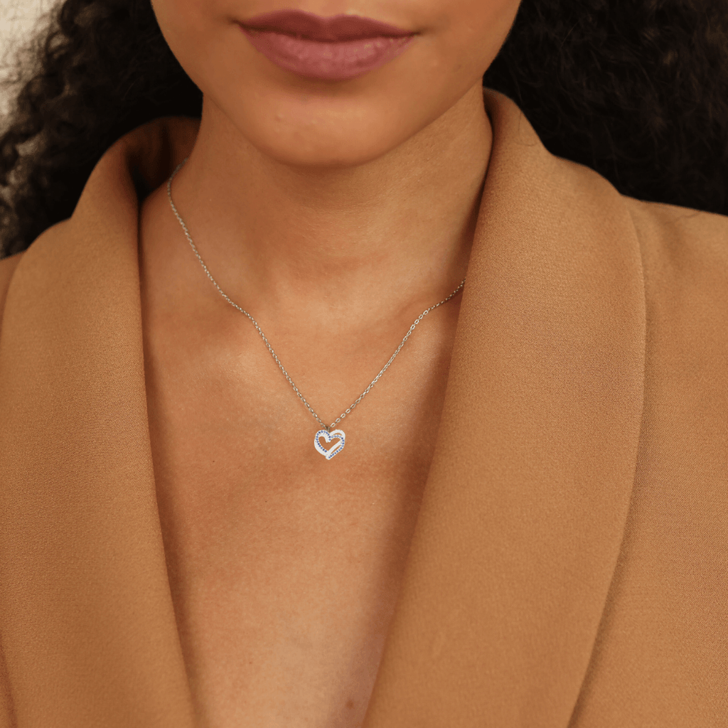 model showcasing Genuine Blue Sapphire Heart Pendant Necklace 