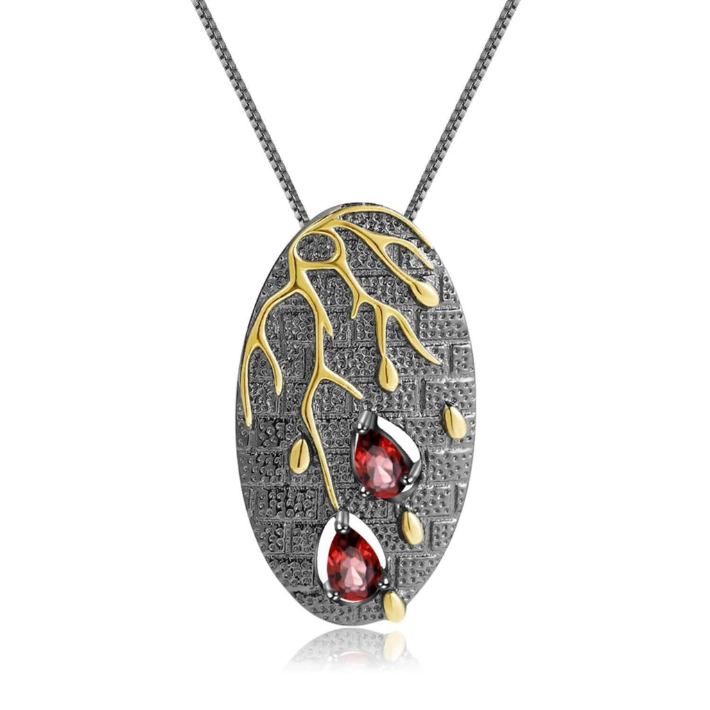 Artisan Gold Plated Garnet Pendant.
$ 50 - 100, Garnet, Pear,  925 Sterling Silver, 925 Sterling Silver Ð Gold Plated Yellow, Fashion