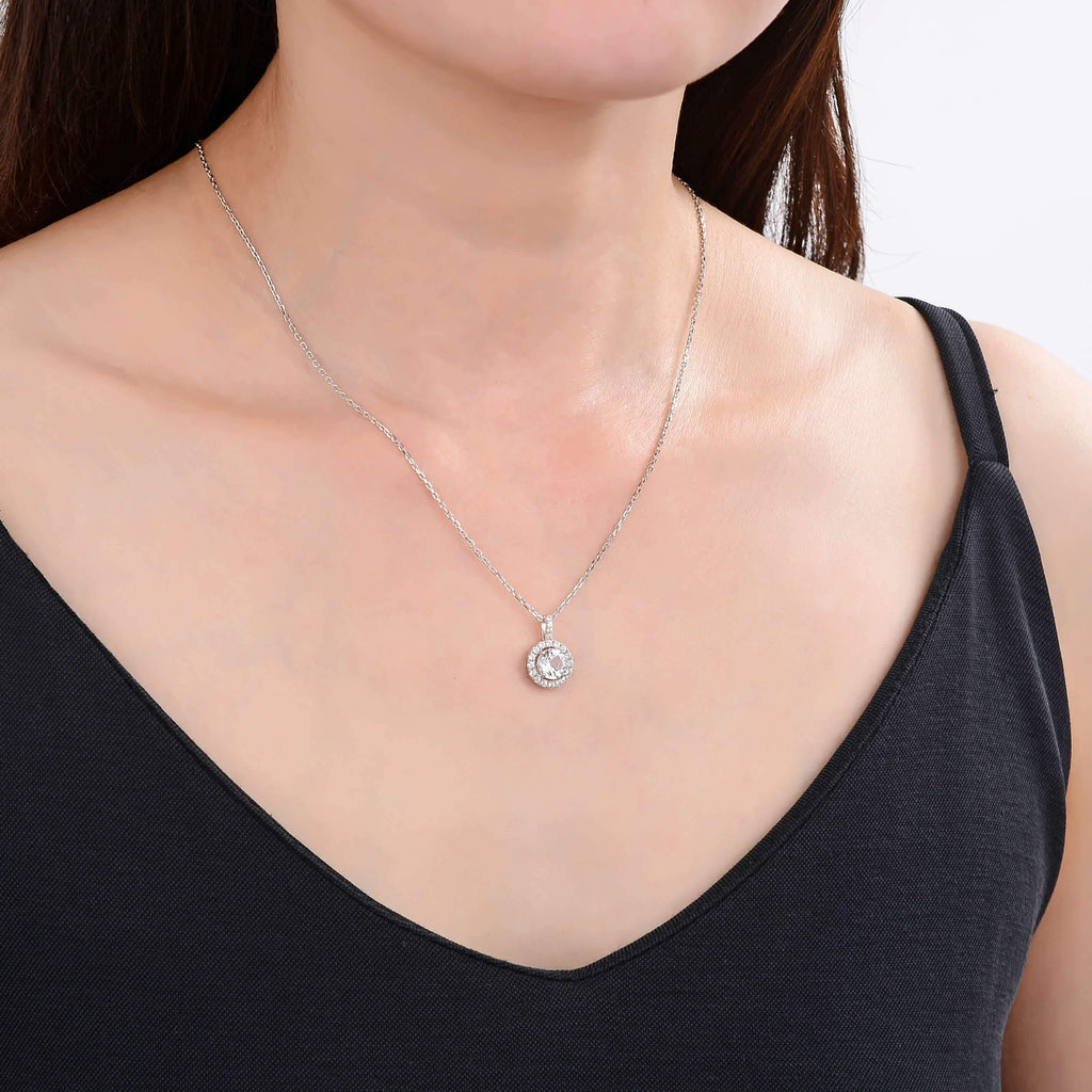 model showcasing Classic Round White Topaz Pendant.$ 50 & Under, White Topaz, White, Round, 925 Sterling Silver, Halo