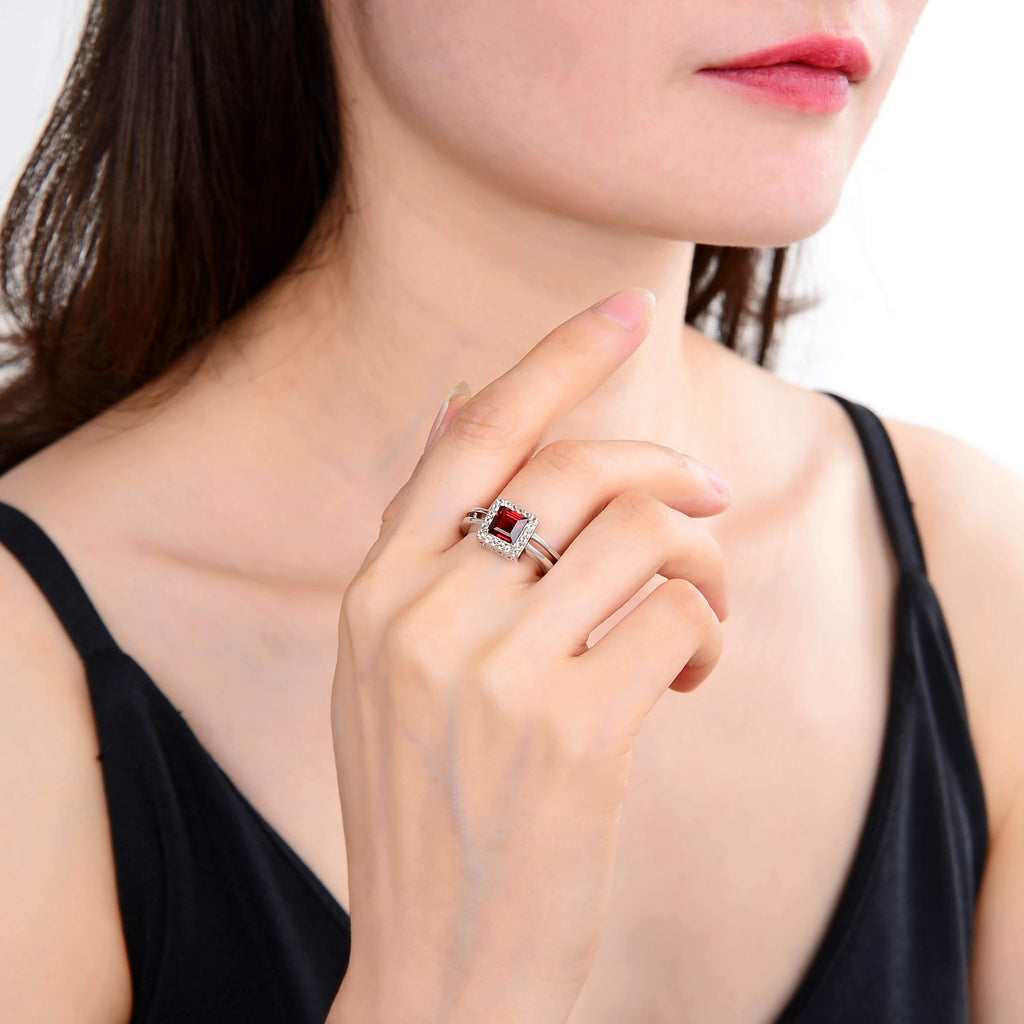 Classic Sterling Silver Garnet and White Topaz Ring.
$ 50 - 100, 6,  Square, Garnet, Pyrope/Dark Red, White, White Topaz, 925 Sterling Silver, Halo