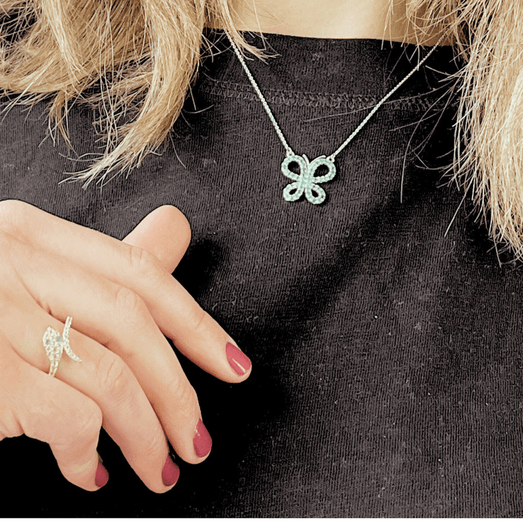 model showcasing butterfly necklace butterfly pendant teen gift silver necklace 925 sterling silver Emerald necklace Emerald pendant green Emerald Emerald butterfly mothers day gift gift for mom dainty necklace gemstone necklaceEmerald Butterfly Necklace - FineColorJewels