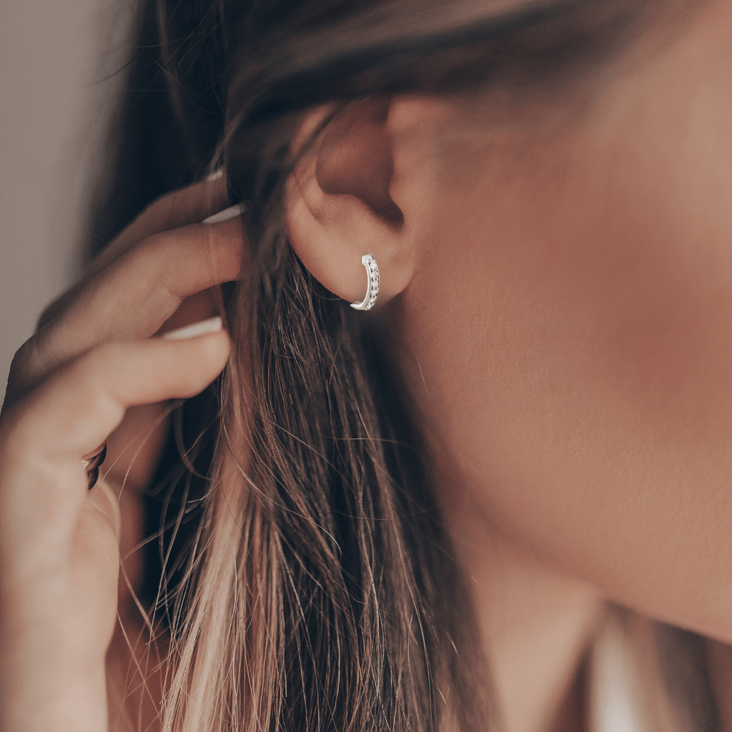 14K gold diamond jewelry, white gold jewelry, lab grown diamond earrings, model wearing lab grown diamond earrings