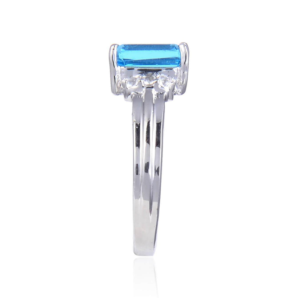 Sterling Silver Emerald Cut Blue Topaz Ring Accented with White Topaz.
$ 50 & Under, 6, 7, 8, Blue, Emerald Cut, Blue Topaz, White Topaz, 925 Sterling Silver, Fashion