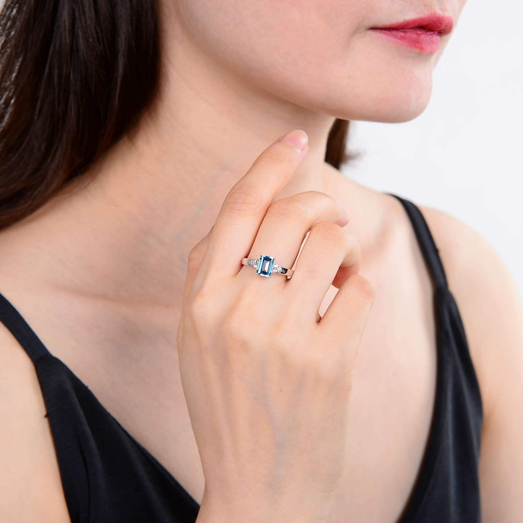 model wearing topaz ring, natural topaz ring design, square topaz ring design, healing gemstone ring